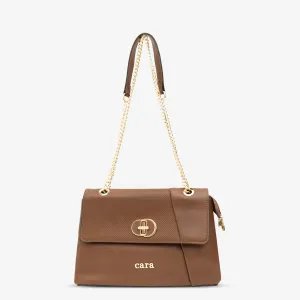 brown UrbaN twist sling bag | cara