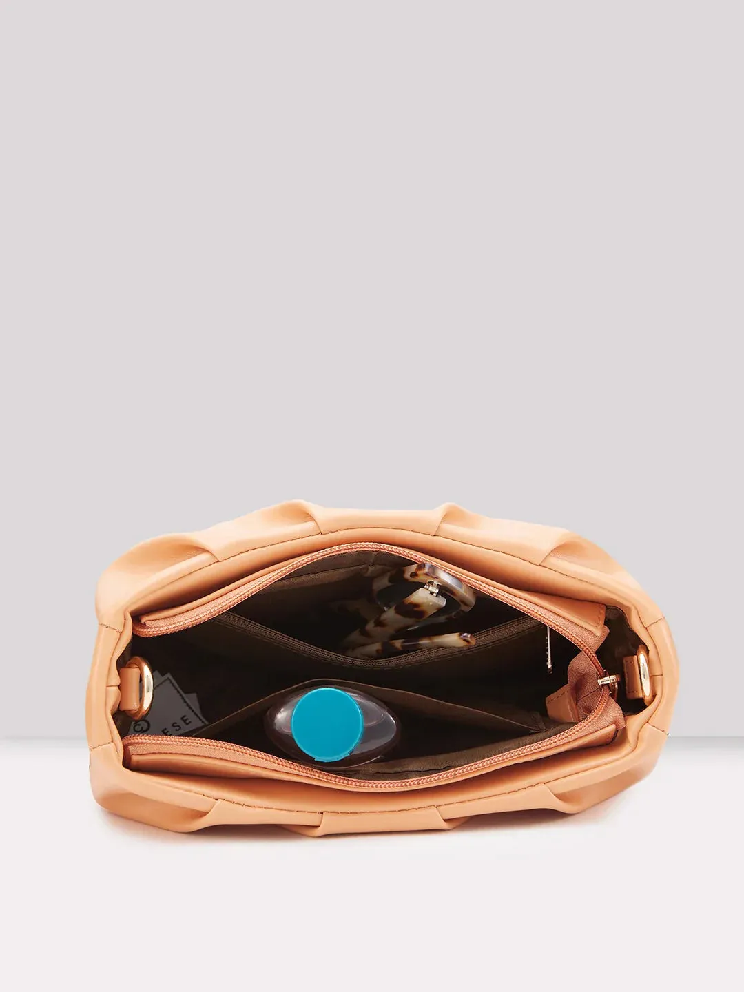 Caprese Pierre Medium Peach Sling Bag