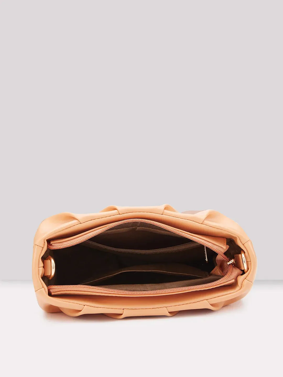 Caprese Pierre Medium Peach Sling Bag