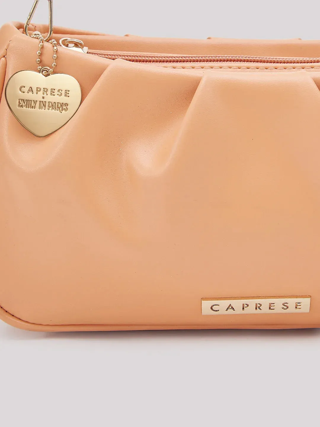 Caprese Pierre Medium Peach Sling Bag