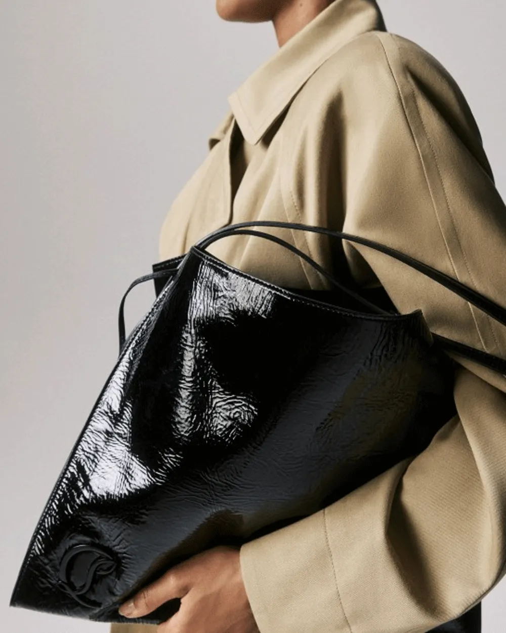 Small Le 54 Patent Leather Drawstring Tote in Black