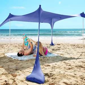 SUN NINJA Pop Up Beach Tent Sun Shelter UPF50  with Sand Shovel, Ground Pegs and Stability Poles, Outdoor Shade for Camping Trips, Fishing, Backyard Fun or Picnics (7x7.5 FT 4 Pole, Royal Blue)